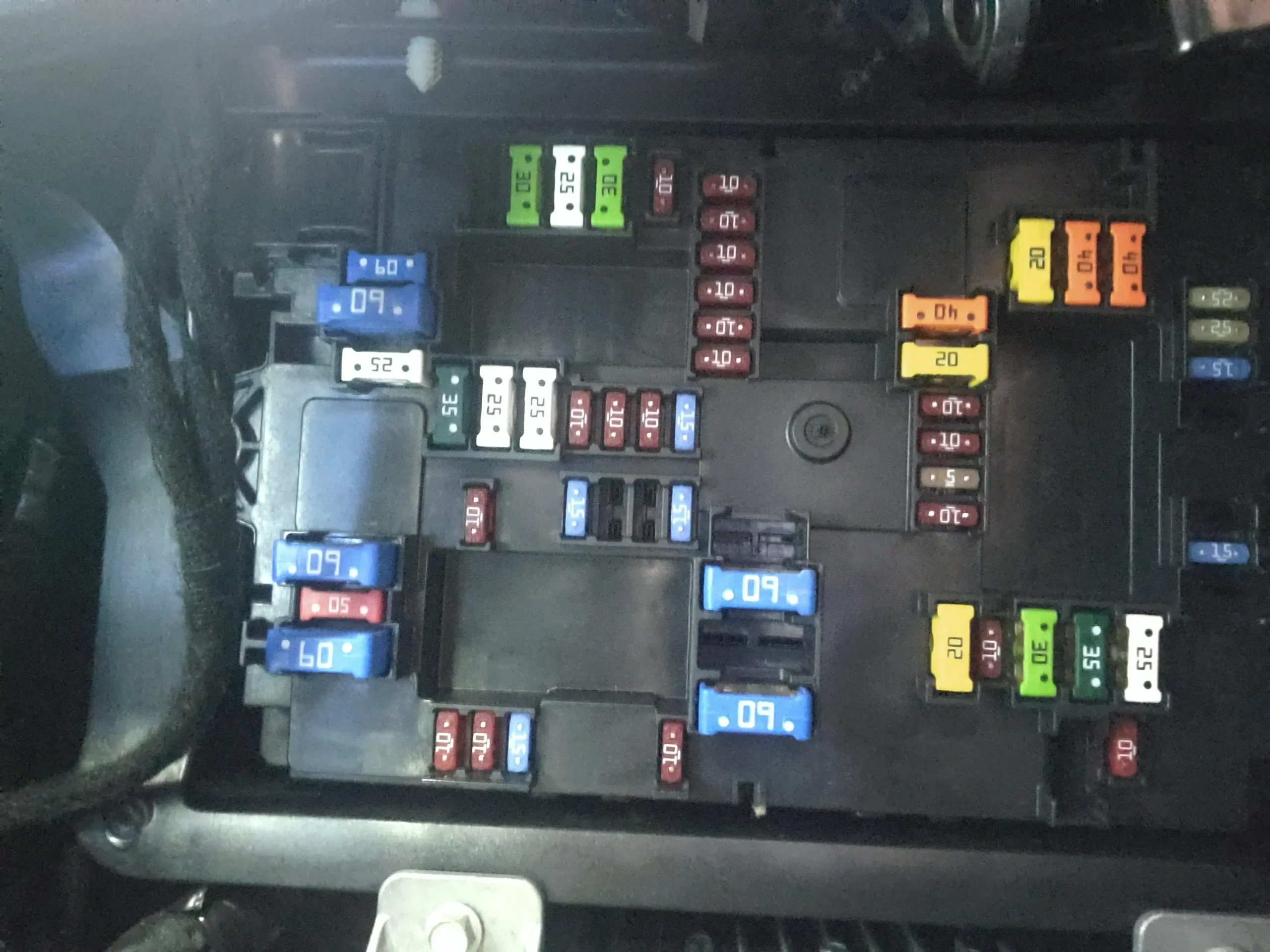 Real photo of the Rivian R1T driver's side fuse box