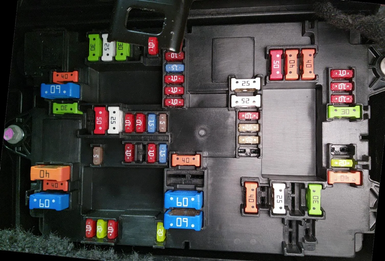 Real photo of the Rivian R1T passenger side fuse box